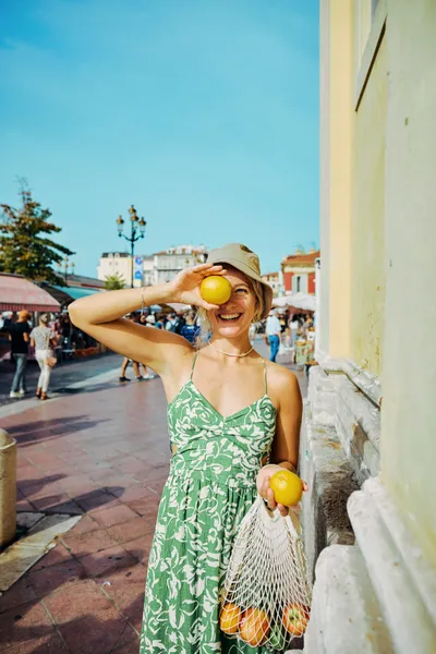 Millenial couple on a budget-friendly vacation in the south of France. Enjoying the beauty of the coastal city of Nice.